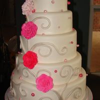 Pink Roses This is five tiers of cake with silver rope vines and pink gumpaste roses. I am finally getting comfortable with fondant. I am noticing...