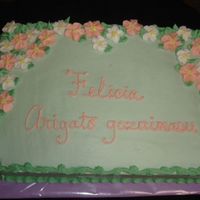 Farewell-Cherry Blossoms I had done a cake similar to this one before, but I liked the contrast of the border color to the base cake on this one. One of my last...