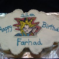 Yu-Gi-Oh Cupcake cake with fbct of yu-gi-oh. Dream whip buttercream.