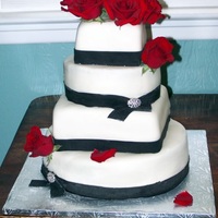 Roses & Crystal Broach Wedding Cake Based off a design by pink cake box.