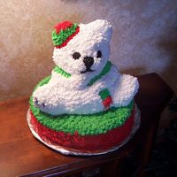 Christmas Bear I did this cake last week for a friend, who donated it for a cake auction to raise extra funds the youth group at church.