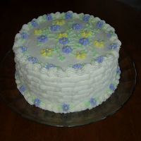 Birthday Cake I did this cake for my Nana's 85th B'day. It is a lemon cake (her fav.) with bc. Her favorite colors are purple and yellow. The...
