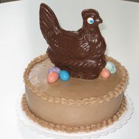 Hazelnut Easter Cake This cake was for an Easter party...so I plunked a store-bought chocolate chicken, and some eggs on it!