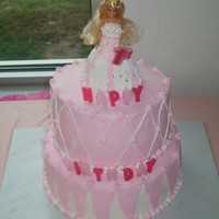 Barbie's First Birthday Two tier cake for the skirt of my mini barbie (i used skipper) I used a ramekin and carved it very little. All butter cream cake.