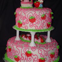 Whimsical Strawberry Shortcaketiered Birthday Cake I did this cake for my Course 3 final cake. I covered the layers in buttercream and fondant. And with buttercream accents. I did chocolate...