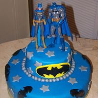 Batman Groom's Cake This was a surprise for the Groom (who is a huge Batman fan). The Bride snuck the figurines over to my house! lol. The cake is chocolate...