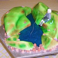 Loch Fishing!! I enjoyed making this cake of a Lock with a man fishing... I wonder if he did catch that fish??