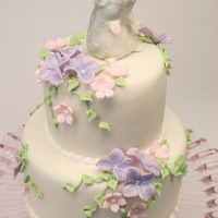 2 Tier Cake With Replica Of A Hamster A small cake with a replica of my daughters little hamster.