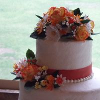 Hook 'em Wedding Cake 14, 10, 6" round, burnt orange cake w/ apricot filling, gumpaste flowers, chocolate pearls