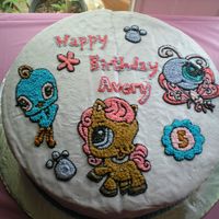 Littlest Pet Shop Animal Cake this was for my daughter's 5th birthday. She wanted it to be half chocolate cake and half yellow cake so that's why you can see a...
