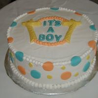 Giraffes And Polka Dots this was a 12 inch round 2 layer white velvet almond cake with cheese cake fluff filling..i made the letters and giraffes out of chocolate...