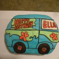 Mystery Machine Cake is (2) 9x13s stacked, filled with buttercream and carved. I used bc icing and mmf for accents. I had never used mmf before, I was...
