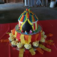 Casey's Circus Birthday cupcakes are strawberry cake and topped with airbrushed mini marshmallows with bc to hold them on for popcorn bags. Cake is Chocolate...