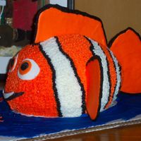 Nemo Clownfish This was for my 3 year old party at daycare. Buttercream body/fins are color flo (1st attempt - -took forever to dry) & eyes are...