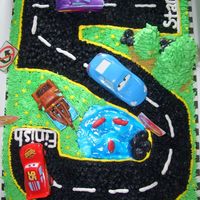 Cars Cake I know my customer found a pic of a cake like this on this site I am just not sure who it belongs to. THANK YOU whoever you are..LOL Anyway...