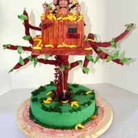 Monkey_Treehouse.jpg This was so much fun to do! Base cake was 14" and treehouse was 8" tripple stacked. Shaped the branches out of wire and then...