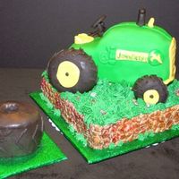 John_Deer_Tractor.jpg Babies first birthday. Since I have THE hardest time with RKT, I used bagels covered in fondant for the wheels. Smash cake was of course a...