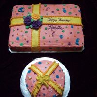 1St Birthday Present Cake Plus Smash Cake I'd never heard of a smash cake until reading about them on CC - what a fun idea! This was for my niece's first birthday.