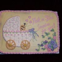 My Version Of Wilton Baby Carriage Cake This was for a celebration at work. My thanks to CC members that helped me find the inspiration picture I was looking for.