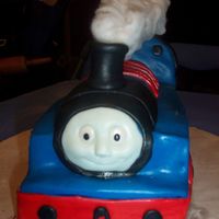 100_2905.jpg Thomas the train covered and detailed with fondant.