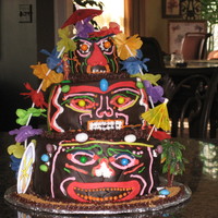Tiki/hawaiian Theme Cake practicing fondant work. Cake is covered in fondant with BC piping and a few hawaiian extras. Used some jelly beans and licorice strings,...