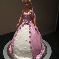 Barbie / Dolly Varden Ultimately rich choc cake, BC icing and covered in fondant.