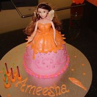 Fairy Vanilla sponge cake. This was done for my daughter. She only had 2 requests..1)orange and 2) fairy.