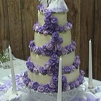 Purple Roses My second wedding cake. It's all buttercream.