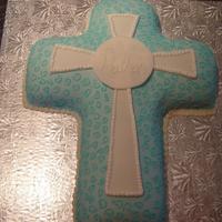Baptism Cross Made two cross cakes for a twins baptism. The mom picked the design from the Wilton website. The original design by Wilton is in blue.