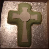 Baptism Cross Made two cross cakes for a twins baptism. The mom picked the design from the Wilton website. The original design by Wilton is in blue.