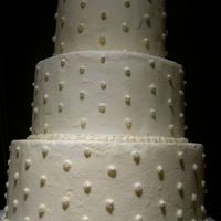 White Buttercream Cake With Buttercream Pearls Practice cake frosted with all buttercream. I made buttercream pearls on the cake and on the boarder and made them pearlized with luster/...