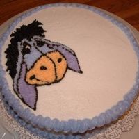 Eeyore OK. Attempt number two at decorating a cake. I just transferred an image of eeyore using piping gel, then outlined and filled in. I'm...