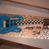 Electric Guitar Loved doing this cake for my Big Brother-just turned 40 and plays the guitar. Combo of carrot cake for the guitar body w/ cream cheese...
