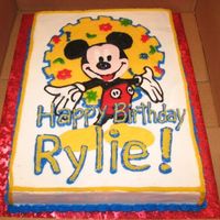 Mickey Mouse Cake 1/2 yellow, 1/2 choc. sheet cake. FBCT and BC frosting.
