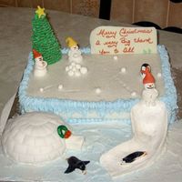 Winter Wonderland White cake with strawberry filling, fondant Igloo and slide. Tree is royal icing. This was a last minute paid cake. I have to admit this...