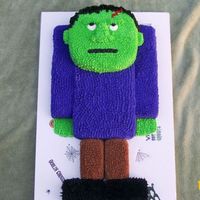 Frankie I made this for my son's Halloween party in school. Parts of Frankie were chocolate cake and part of him was butter cake. The icing...