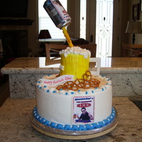 Beer Cake 12" round Lemon with raspberry filling and buttercream icing