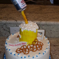 Beer Cake 12" round Lemon with raspberry filling and buttercream icing