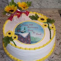 50Th Anniversary 12" Vanilla cake with raspberry filling and whipped cream icing/buttercream trim