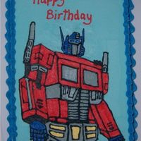 Optimus Prime Cake I've just finished my husband's birthday cake. He's a big transformers fan, so I went with Optimus Prime. I think his head...