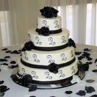 Black And White Wedding Cake I was very happy with this cake! My 3rd wedding cake and probably my best cake ever! It was for a coworker?s sister, 16?, 14?, 10?, and 6?...