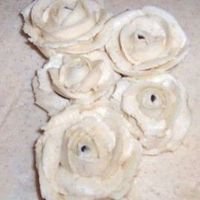 My 1St Roses First time making roses, they are on hershey's kisses, you can see the tip of them, o well, I felt like they turned out pretty good.