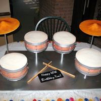 Drum Set Cake This set is nearly full size to feed 100. 2 9", 1 10" and 1 12" round cakes. The cymbals are dried gumpaste as are the...
