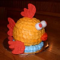 Fish Cake I copied a cake picture I saw here and added a few twists to it. I did this for a benefit for a friend.