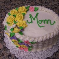 Mothers Day Cake Did I mention I LOVE basketweave! It's my favorite.Chocolate cake with fruit filling and buttercream frosting. Flowers made out of...