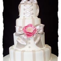 Fondant Bows The bride brought me in s photo of a cake very similar for me to copy. The original was a buttercream finish I think and mine if fondant....