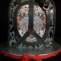 Ed Hardy Purse/bag Red Velvet Cake with Cream Cheese Icing for 16 year old girls birthday. Only my second purse/bag cake I have made. Thanks for looking.