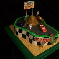 Cars Birthday Cake CC inspired cake for little boys 3rd birthday. Chocolate and Strawberry cake with vanilla mousse filling.