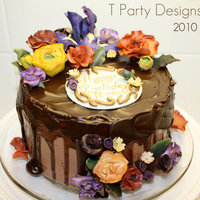 Chocolate Ganache Sugar Flower Cake This cake was Chocolate Heaven! Choc cake, with CG buttercream & CG glaze on top. All flowers are made of gumpaste.