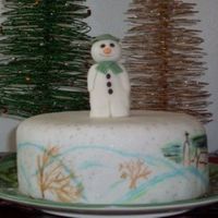 The Snowman Inspired by the beloved children's story, and my husband's favorite. Christmas cake covered in marzipan and fondant, then painted...